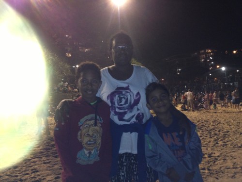 on the beach waiting for the fire works to begin